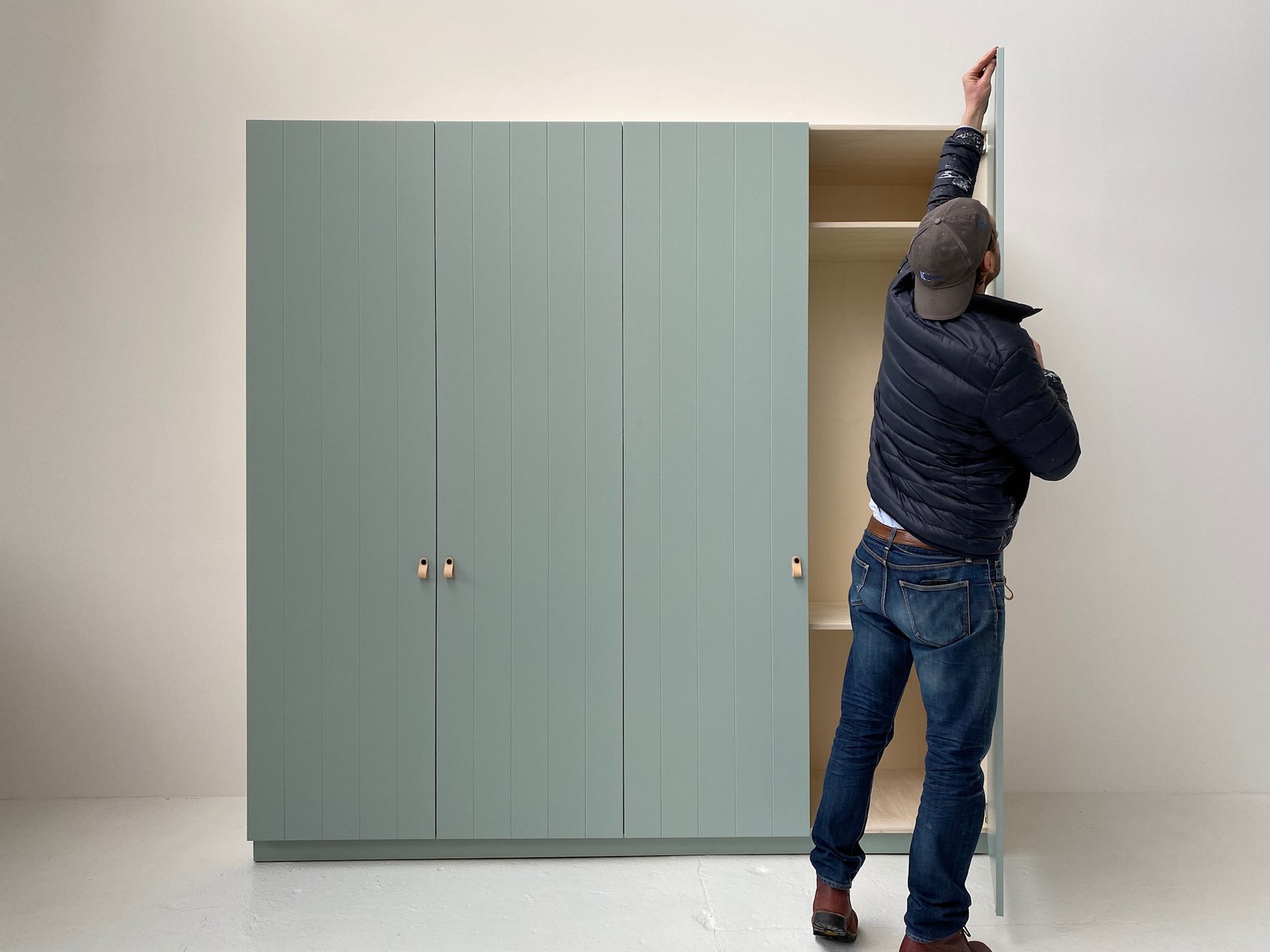 Stuart adjusting a door during installation