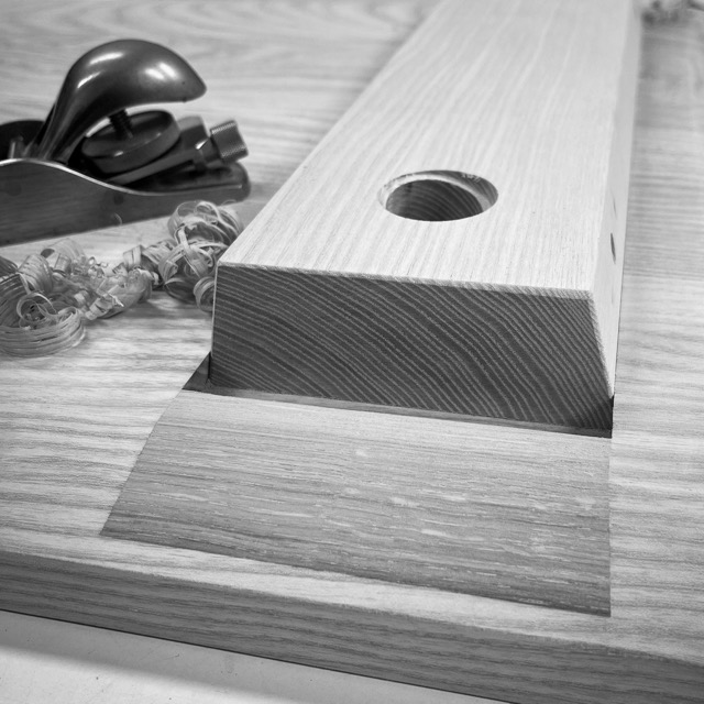Dovetail batten detail with hand plane and shavings